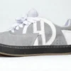 ache foowear Flat SB Carnaza gris/logo blanco/suela negra